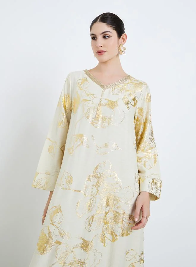 أميرة جلابية بتفاصيل شرابات وطبعة زهور